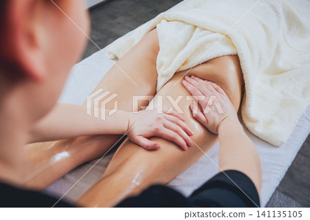 Young girl is relaxing in the spa. Young girl is relaxing in the spa. 141135105