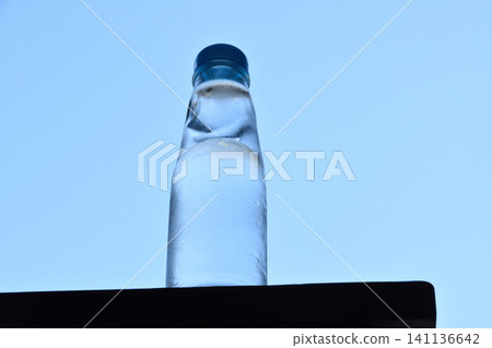 A bottle of ramune and a blue sky A bottle of ramune and a blue sky 141136642