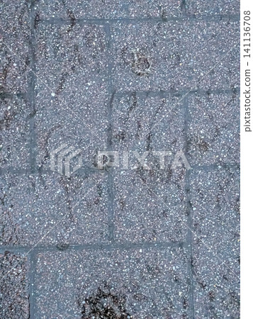 Texture of cobblestone paving blocks submerged in water | Background material representing a road surface underwater Texture of cobblestone paving blocks submerged in water | Background material representing a road surface underwater 141136708