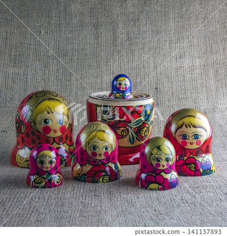 Four Hand Painted Wooden Nesting Dolls Displayed Together Four Hand Painted Wooden Nesting Dolls Displayed Together 141137893