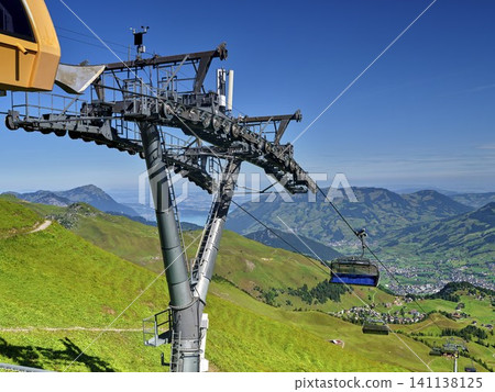 Breathtaking Mountain Landscape With Stoosbahn Funicular in the Swiss Alps Breathtaking Mountain Landscape With Stoosbahn Funicular in the Swiss Alps 141138125