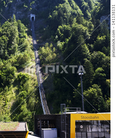 Scenic View of Stoosbahn Funicular Ascending the Lush Swiss Alps Scenic View of Stoosbahn Funicular Ascending the Lush Swiss Alps 141138131