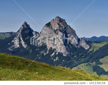 Majestic Grosser Mythen and Kleiner Mythen Mountains in Summer Sun Majestic Grosser Mythen and Kleiner Mythen Mountains in Summer Sun 141138138