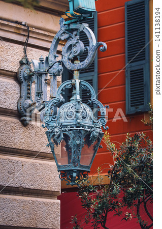 Old vintage metal lanterns or street lamps on building of Opera de Nice, France 141138194