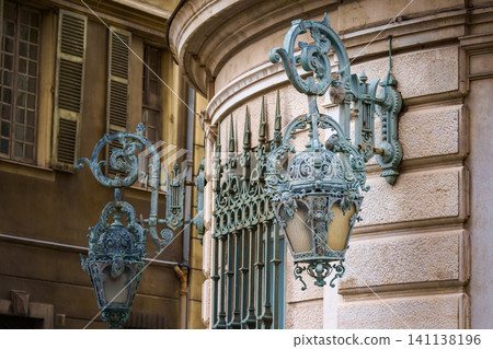 Old vintage metal lanterns or street lamps on building of Opera de Nice, France Old vintage metal lanterns or street lamps on building of Opera de Nice, France 141138196