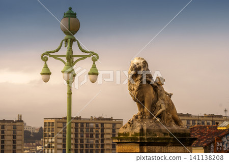 MARSEILLE, FRANCE - 10 Nov 2018 - Lion statue of the stairs decoration near the Saint Charles train station in Marseille MARSEILLE, FRANCE - 10 Nov 2018 - Lion statue of the stairs decoration near the Saint Charles train station in Marseille 141138208