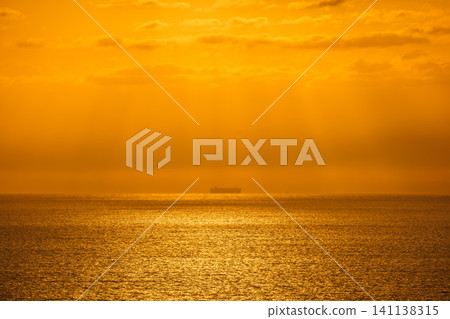 Beatiful sunset above the mediterranean sea. Sunrise with red and orange skies and the sun shining Beatiful sunset above the mediterranean sea. Sunrise with red and orange skies and the sun shining 141138315