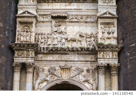 NAPLES, ITALY - NOVEMBER 05, 2018 - The medieval castle of Maschio Angioino or Castel Nuovo or New Castle and its elements of decoration, Napoli NAPLES, ITALY - NOVEMBER 05, 2018 - The medieval castle of Maschio Angioino or Castel Nuovo or New Castle and its elements of decoration, Napoli 141138540