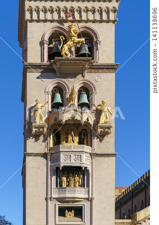 MESSINA, ITALY - NOVEMBER 06, 2018 - The bell tower with carillon of the Duomo Cathedral in Sicily MESSINA, ITALY - NOVEMBER 06, 2018 - The bell tower with carillon of the Duomo Cathedral in Sicily 141138696