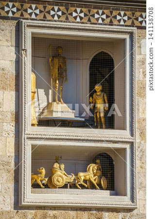 MESSINA, ITALY - NOVEMBER 06, 2018 - Decorations and golden elements of the Bell Tower of the Cathedral of Messina, Sicily MESSINA, ITALY - NOVEMBER 06, 2018 - Decorations and golden elements of the Bell Tower of the Cathedral of Messina, Sicily 141138708