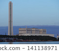 Towering chimneys of a power plant 141138971