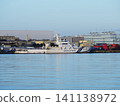 The patrol vessel PL62 Naniwa is moored at anchor. 141138972