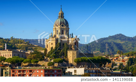 Panoramic top view of the local buildings with the trees, mountains and the sky in the beautiful city of Messina, Sicily, Italy Panoramic top view of the local buildings with the trees, mountains and the sky in the beautiful city of Messina, Sicily, Italy 141139088
