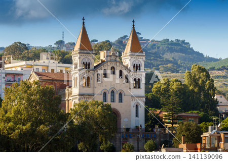 Panoramic top view of the local buildings with the trees, mountains and the sky in the beautiful city of Messina, Sicily, Italy Panoramic top view of the local buildings with the trees, mountains and the sky in the beautiful city of Messina, Sicily, Italy 141139096