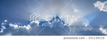 Sun shining through the heavenly beautiful clouds 141139110