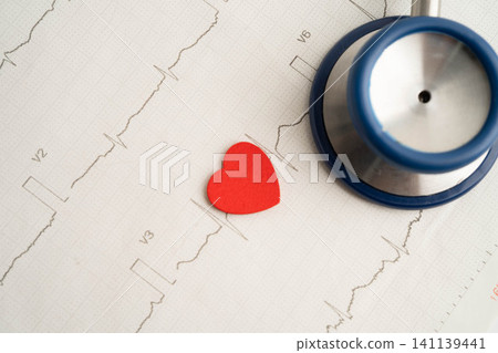 Stethoscope on electrocardiogram ECG, heart wave, heart attack, cardiogram report. Stethoscope on electrocardiogram ECG, heart wave, heart attack, cardiogram report. 141139441