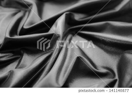 Background black silk fabric luxury abstract textile smooth shadow gradient cloth gray banner product friday presentation, canvas material template decoration elegance textile fashion sale. Background black silk fabric luxury abstract textile smooth shadow gradient cloth gray banner product friday presentation, canvas material template decoration elegance textile fashion sale. 141140877
