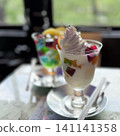 A delicious-looking parfait and drink in a retro Showa-era atmosphere. 141141358