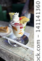 A delicious-looking parfait and drink in a retro Showa-era atmosphere. 141141360