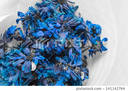 Dried blue cornflower flowers dead dry nature of the plant on a white background Dried blue cornflower flowers dead dry nature of the plant on a white background 141142764