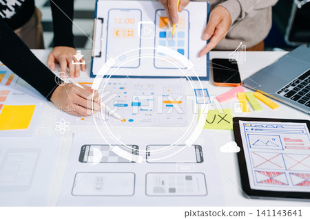 UX graphic designer planning application process development prototype wireframe for web smart phone. Creative digital development UX graphic designer planning application process development prototype wireframe for web smart phone. Creative digital development 141143641