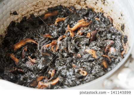 Dried shiitake mushroom and seaweed tsukudani cooked in a Yukihira pot. Dried shiitake mushroom and seaweed tsukudani cooked in a Yukihira pot. 141143899