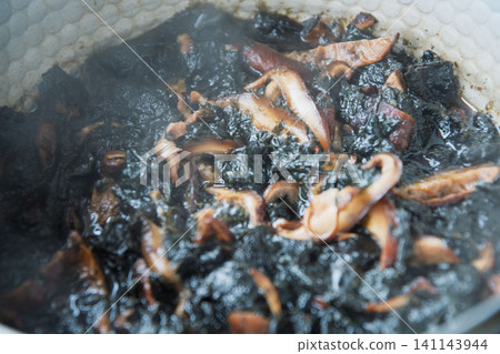 Seaweed simmered in soy sauce with dried shiitake mushrooms Seaweed simmered in soy sauce with dried shiitake mushrooms 141143944