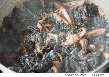 Seaweed simmered in soy sauce with dried shiitake mushrooms Seaweed simmered in soy sauce with dried shiitake mushrooms 141143945