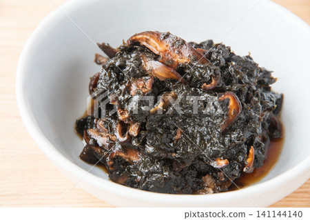Freshly made seaweed tsukudani served in a bowl. Freshly made seaweed tsukudani served in a bowl. 141144140