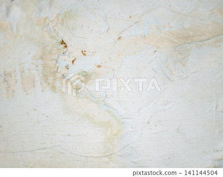Abstract background of a weathered and distressed wall with peeling paint and plaster in faded light blue and beige tones, showcasing aged texture and grunge details. Abstract background of a weathered and distressed wall with peeling paint and plaster in faded light blue and beige tones, showcasing aged texture and grunge details. 141144504