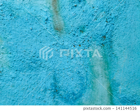 Abstract background of a weathered and distressed wall with peeling paint and plaster in faded light blue and beige tones, showcasing aged texture and grunge details. Abstract background of a weathered and distressed wall with peeling paint and plaster in faded light blue and beige tones, showcasing aged texture and grunge details. 141144516