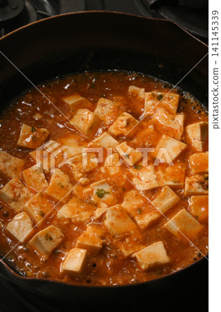 Mapo tofu being cooked Mapo tofu being cooked 141145339