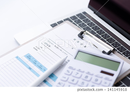Quotation, calculator, and computer Quotation, calculator, and computer 141145918