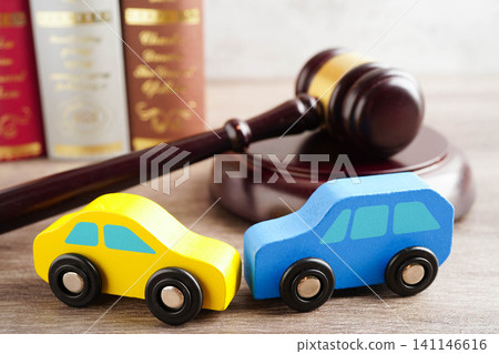 Car accident lawsuit and insurance, Judge hammer with car model. Car accident lawsuit and insurance, Judge hammer with car model. 141146616