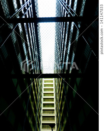 The sky and light visible between the skyscrapers The sky and light visible between the skyscrapers 141147833