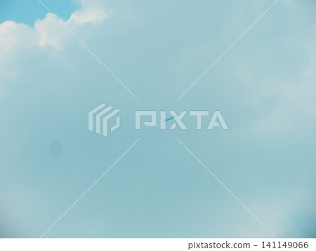 The silhouette of an airplane floating alone in the blue sky The silhouette of an airplane floating alone in the blue sky 141149066