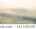Roads shrouded in morning mist 141149106