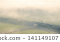 Roads shrouded in morning mist 141149107