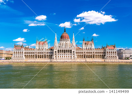 The magnificent Hungarian Parliament building, viewed from across the Danube River in Budapest, Hungary. The magnificent Hungarian Parliament building, viewed from across the Danube River in Budapest, Hungary. 141149499