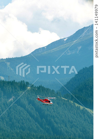 Bansko, Bulgaria red medical emergency helicopter flying over green Pirin mountains Bansko, Bulgaria red medical emergency helicopter flying over green Pirin mountains 141149979