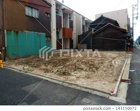 A vacant lot in the city, captured with a wide-angle lens. A vacant lot in the city, captured with a wide-angle lens. 141150072