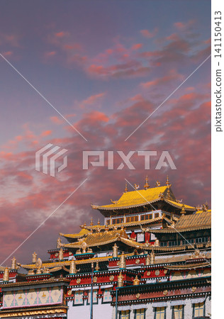 Songzanlin Monastery at sunset with golden light, Shangri-La, Tibet, China Songzanlin Monastery at sunset with golden light, Shangri-La, Tibet, China 141150413