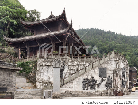 The iconic multi-tiered wooden pavilions and Jiuli Palace structures of Chiyou Jiuli City, China's largest traditional Miao ethnic group architectural complex in Pengshui County. The iconic multi-tiered wooden pavilions and Jiuli Palace structures of Chiyou Jiuli City, China's largest traditional Miao ethnic group architectural complex in Pengshui County. 141151097