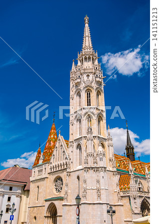 Matthias Church (Church of Our Lady) in Budapest, Hungary, stands out against the blue sky. Matthias Church (Church of Our Lady) in Budapest, Hungary, stands out against the blue sky. 141151213