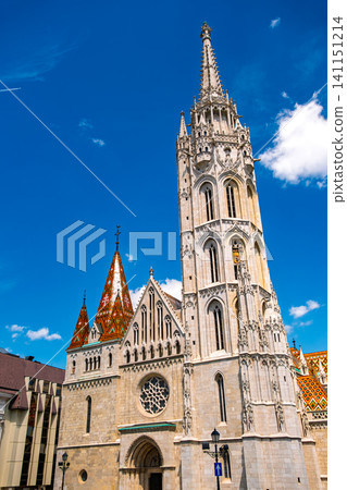 Matthias Church (Church of Our Lady) in Budapest, Hungary, stands out against the blue sky. Matthias Church (Church of Our Lady) in Budapest, Hungary, stands out against the blue sky. 141151214