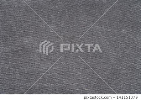 Dark gray denim fabric texture background Dark gray denim fabric texture background 141151379