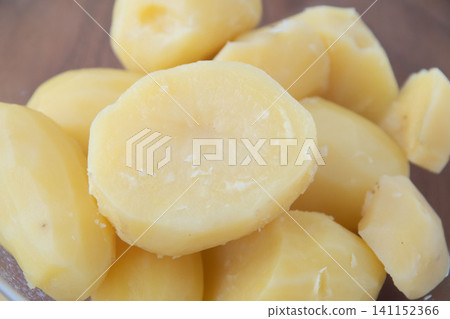 Steamed potatoes in a glass bowl Steamed potatoes in a glass bowl 141152366