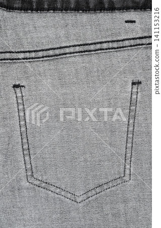 Closeup of denim jeans back pocket with stitching detail Closeup of denim jeans back pocket with stitching detail 141153216