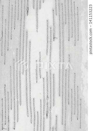 Abstract stitched lines on textured fabric background Abstract stitched lines on textured fabric background 141153223