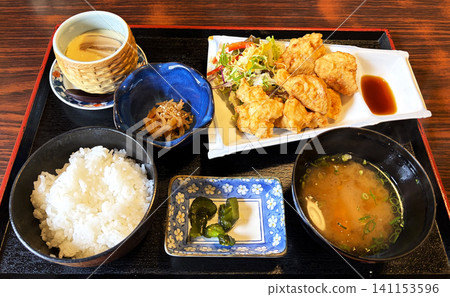 A set meal of toriten (deep-fried chicken), rice, and miso soup. A specialty of Oita Prefecture, Japan. A set meal of toriten (deep-fried chicken), rice, and miso soup. A specialty of Oita Prefecture, Japan. 141153596